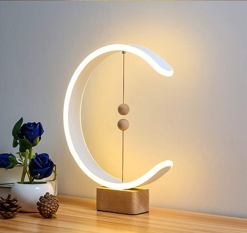 Creative magnetic balance lamp