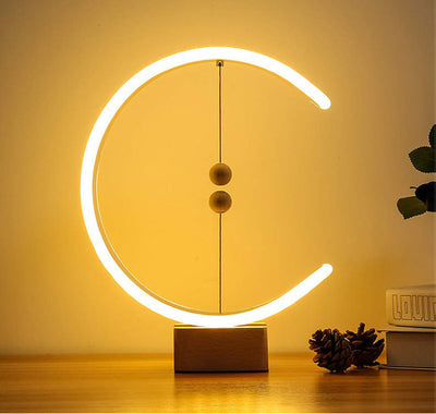 Creative magnetic balance lamp